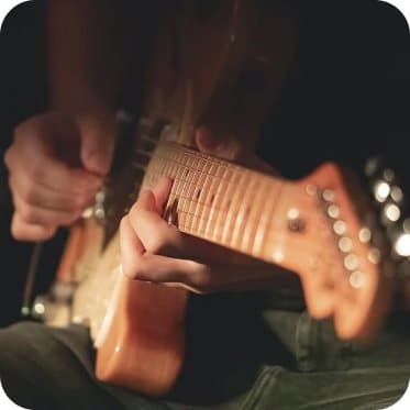 Playing electric guitar
